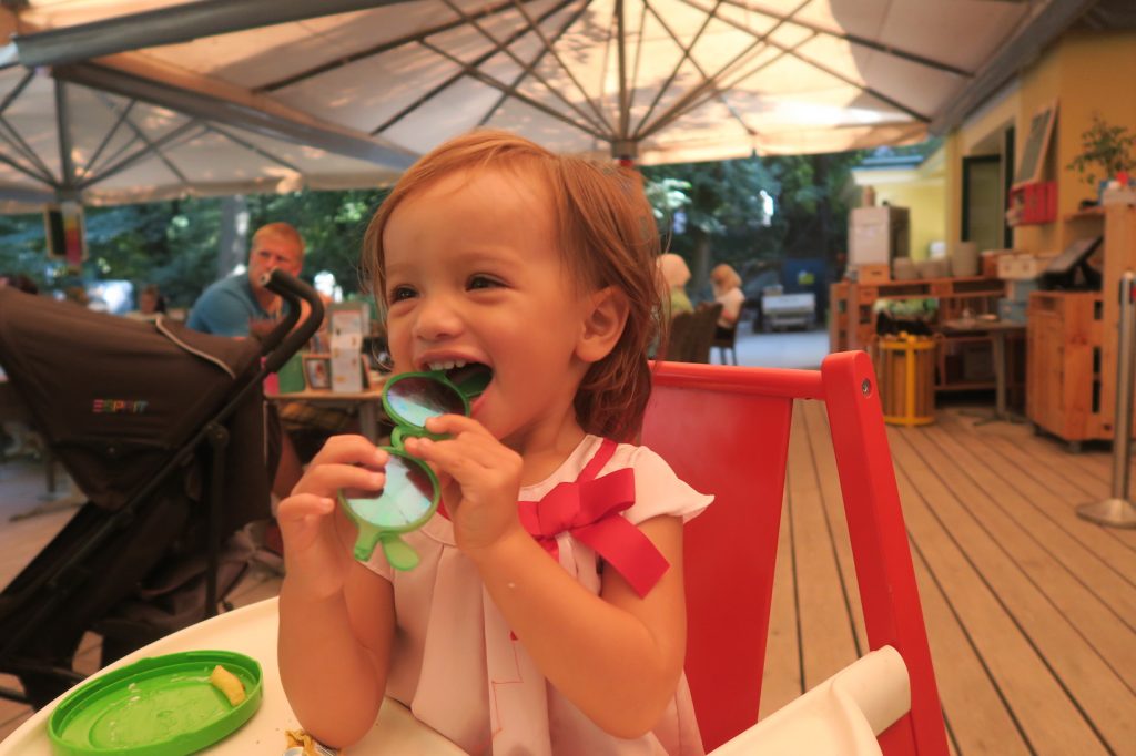 #SiennaLittleExplorer on high chair in Vienna